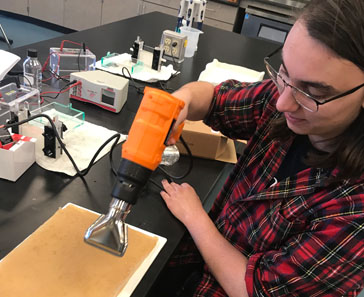 Student using lab equipment from Oracle grant.